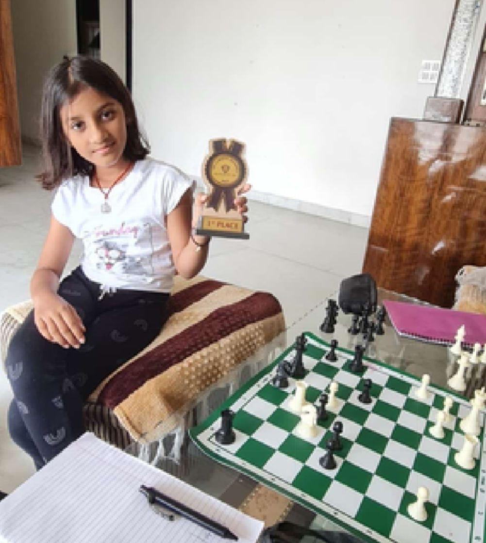 OMCA student practicing at a chess board